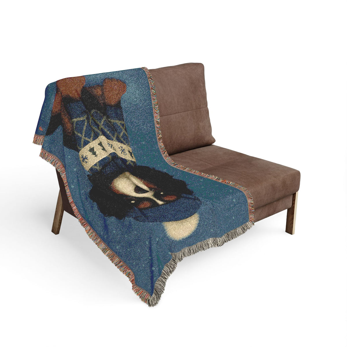 Tricolor Cavalier woven cotton blanket draped over a brown armchair in a living room